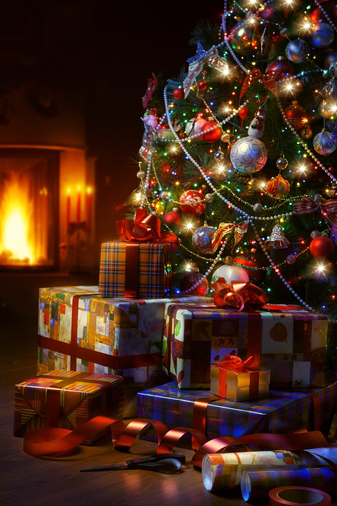 Gifts-beneath-Christmas-tree-in-the-dark